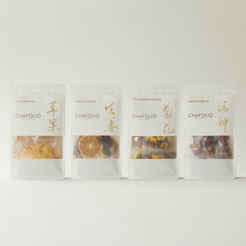 Chafolio’s Mother’s Day Herbal Tea Set features four caffeine-free teas—Apple Fragrant, Dried Fruit Ginger, Chrysanthemum Ginseng, and Hibiscus Rose—beautifully packaged in a row for a delightful gift.