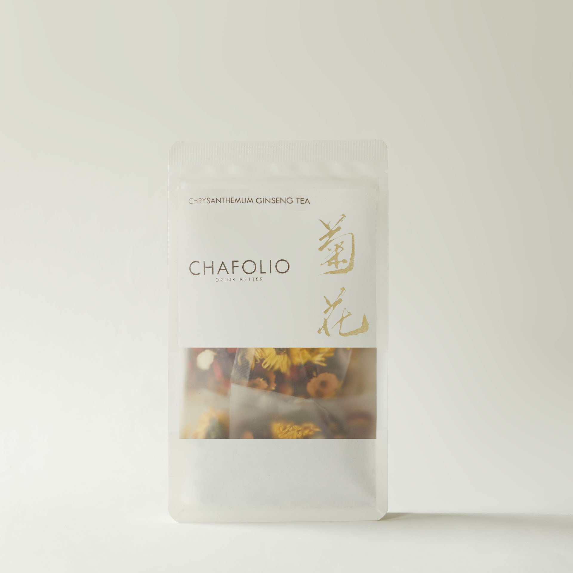 A clear pouch of Chafolio Chrysanthemum Ginseng Tea displays dried flowers inside, highlighting the essence of traditional Chinese herbal tea against a simple light background.
