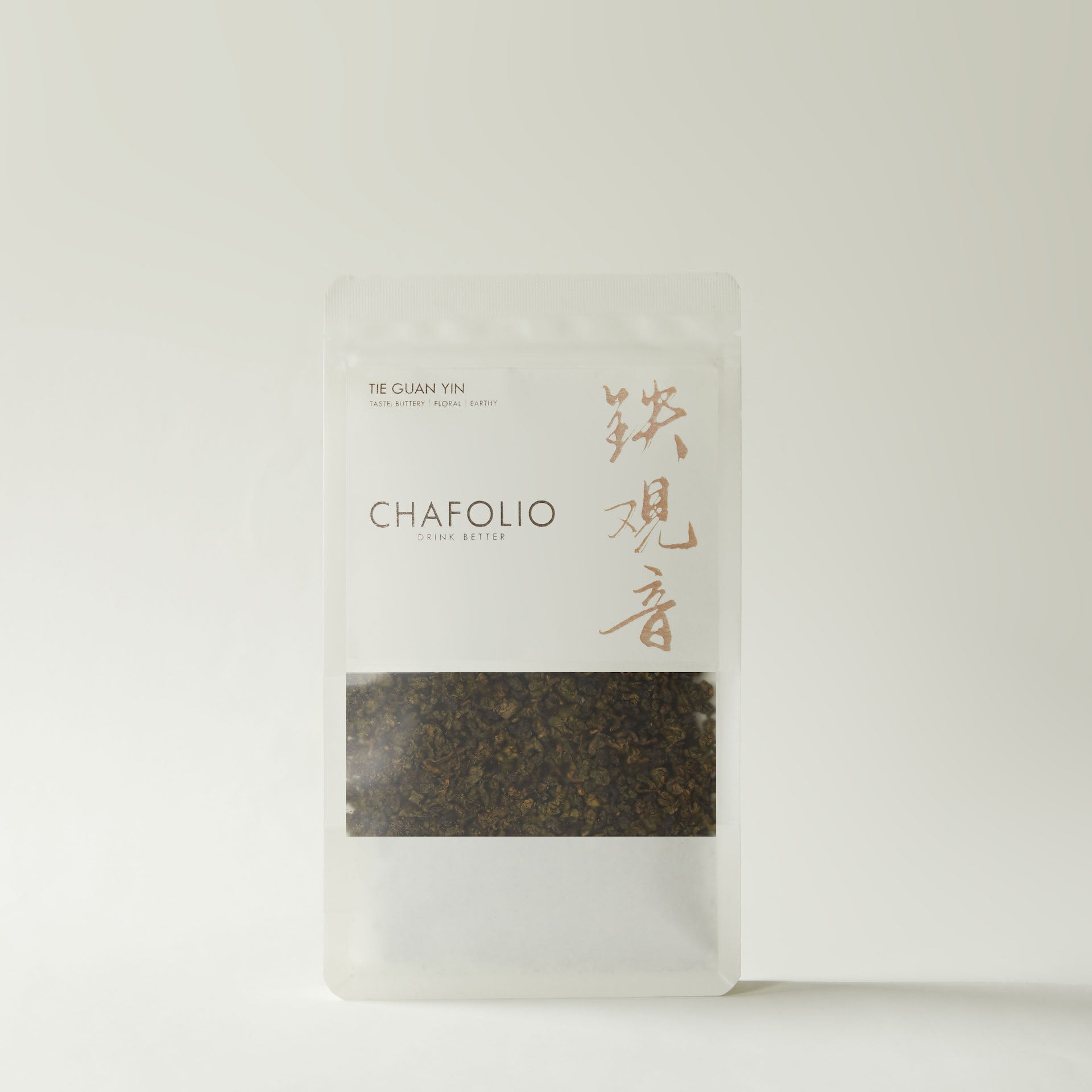 A clear pouch of Chafolio Tie Guan Yin oolong tea with Chinese characters on the label is displayed against a plain light background.
