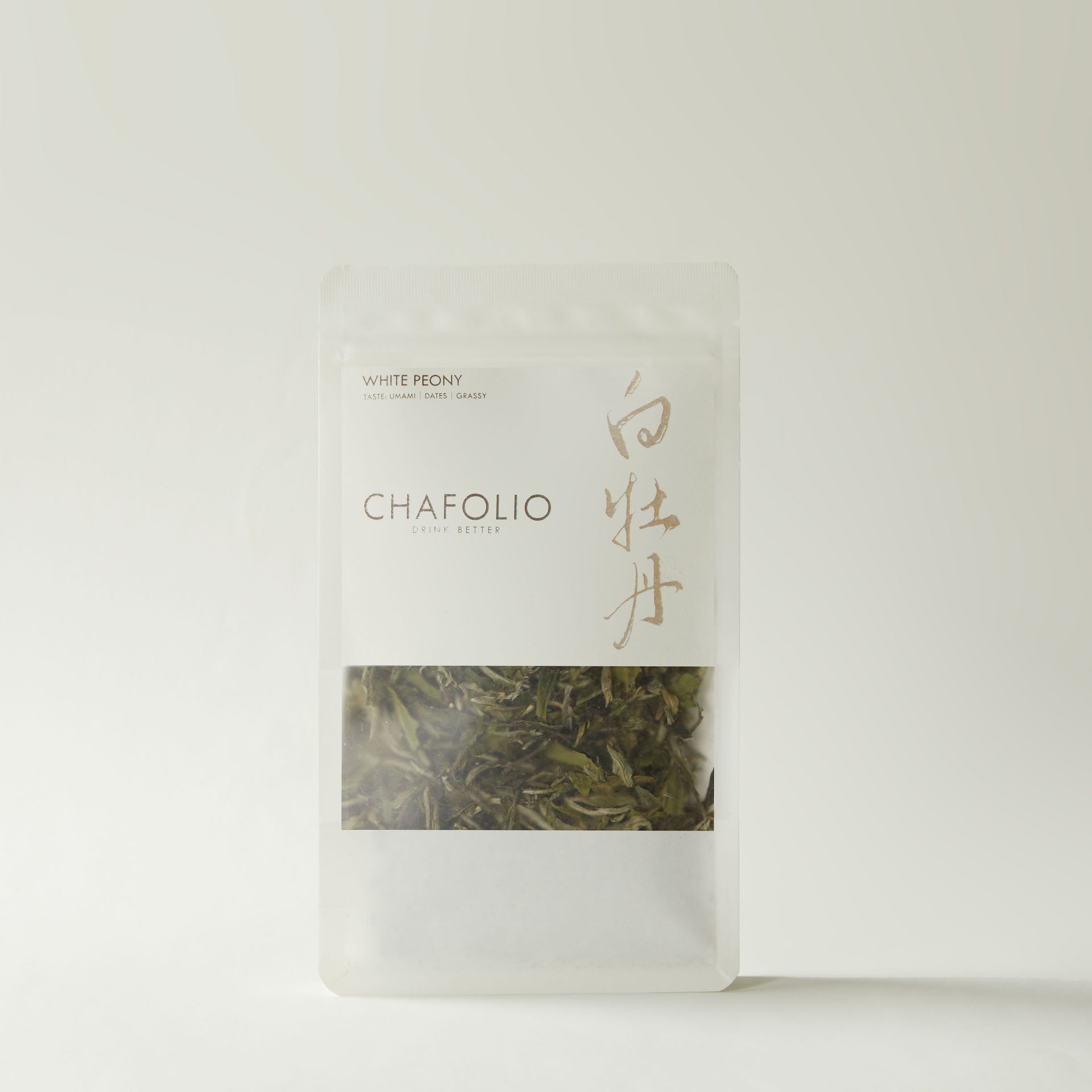 A clear pouch labeled "Chafolio White Peony" contains authentic White Peony tea, featuring Chinese characters on the front, displayed against a plain light background.
